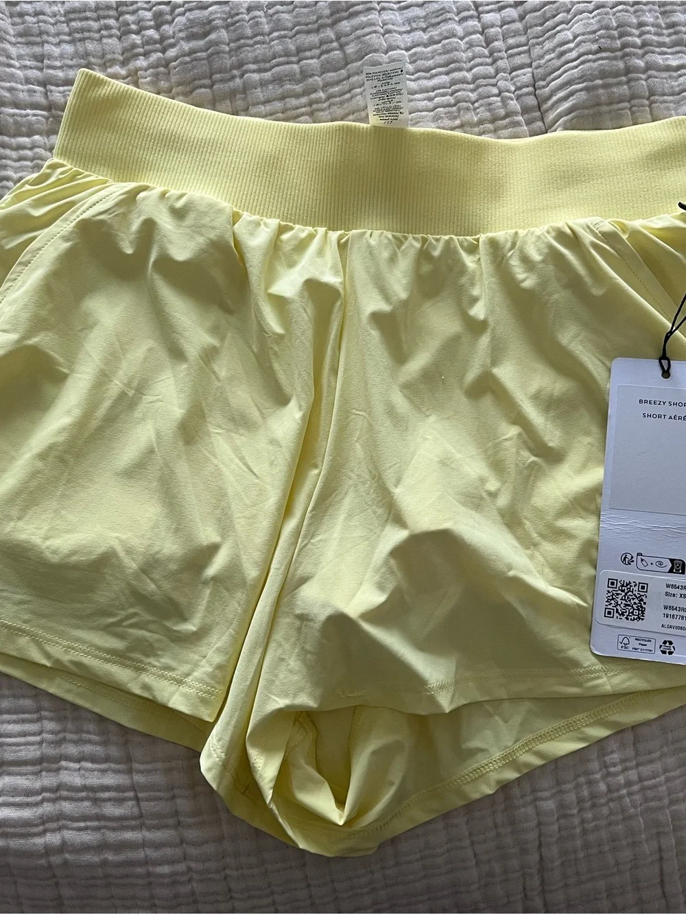 ALO Yoga Breezy Short in Pale Yellow - Picture 1 of 2